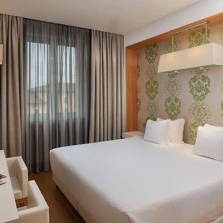 Nh Pisa Hotel Bagian luar foto