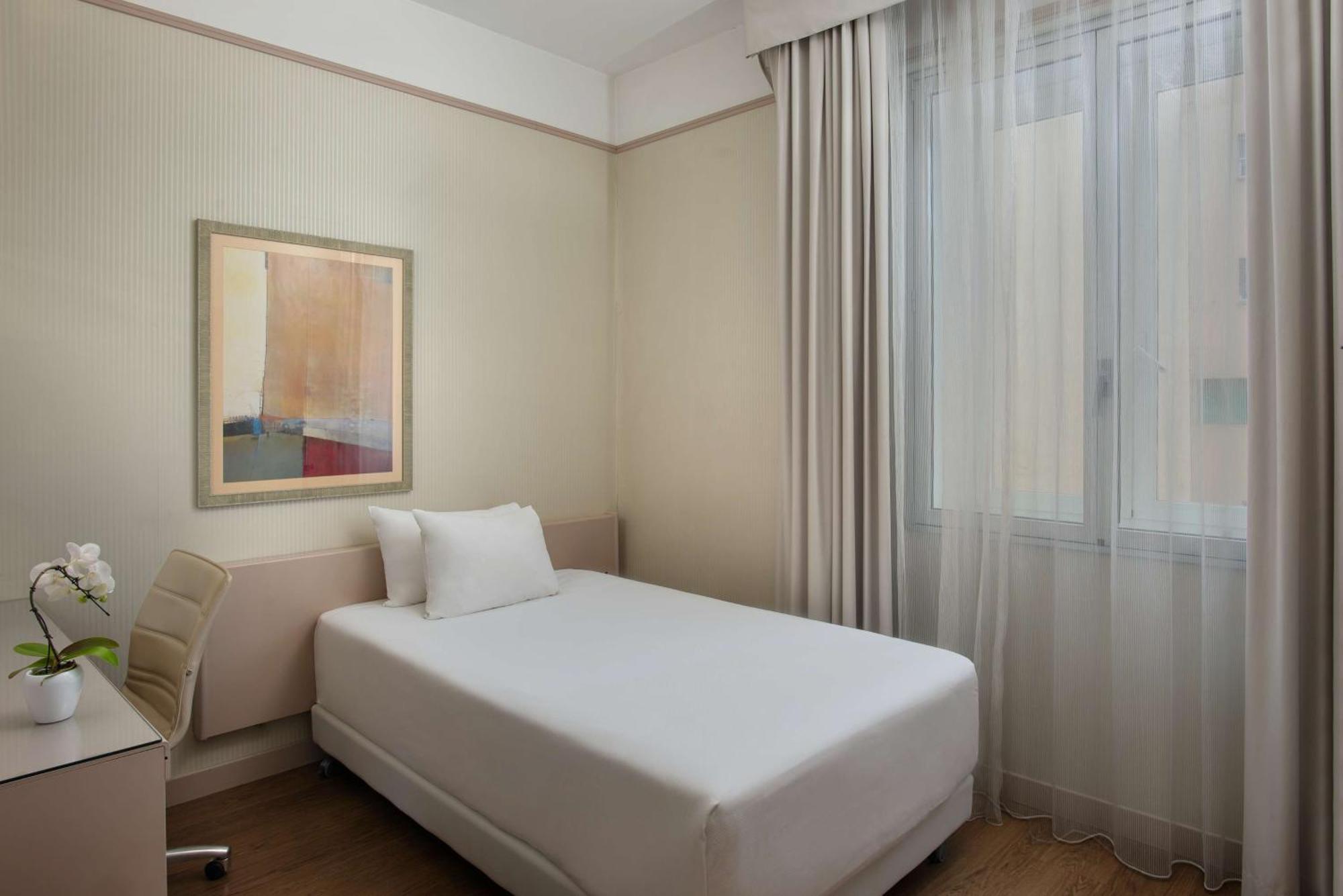 Nh Pisa Hotel Bagian luar foto