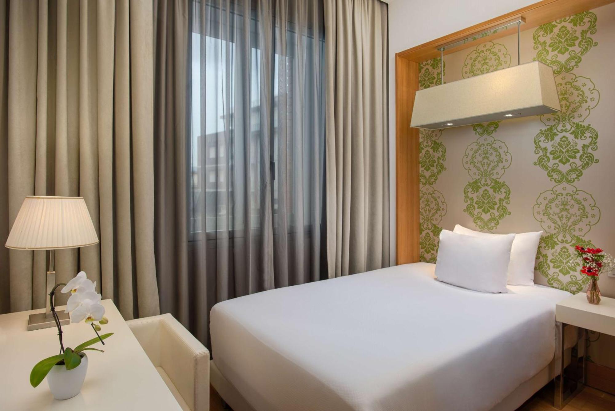 Nh Pisa Hotel Bagian luar foto
