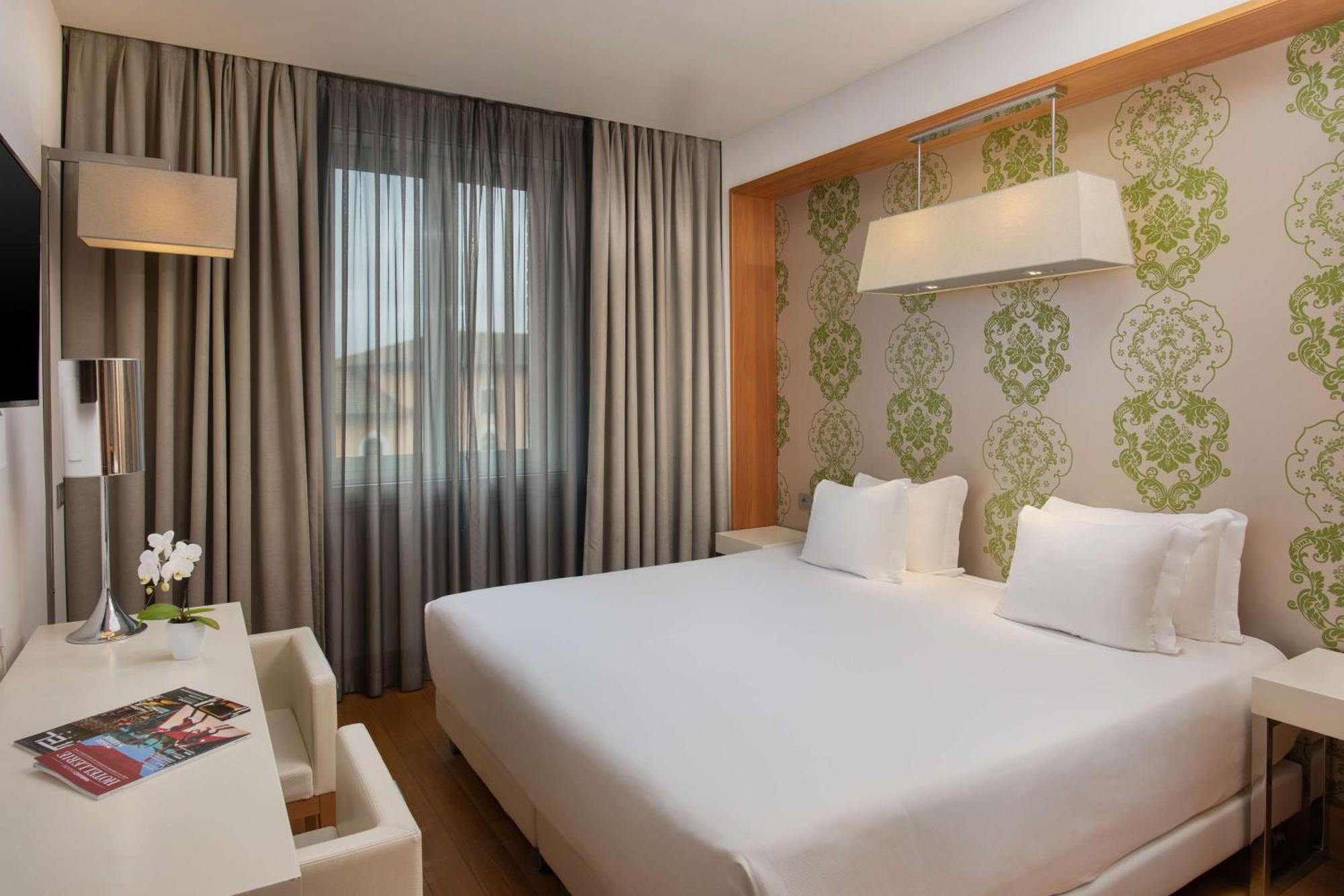 Nh Pisa Hotel Bagian luar foto